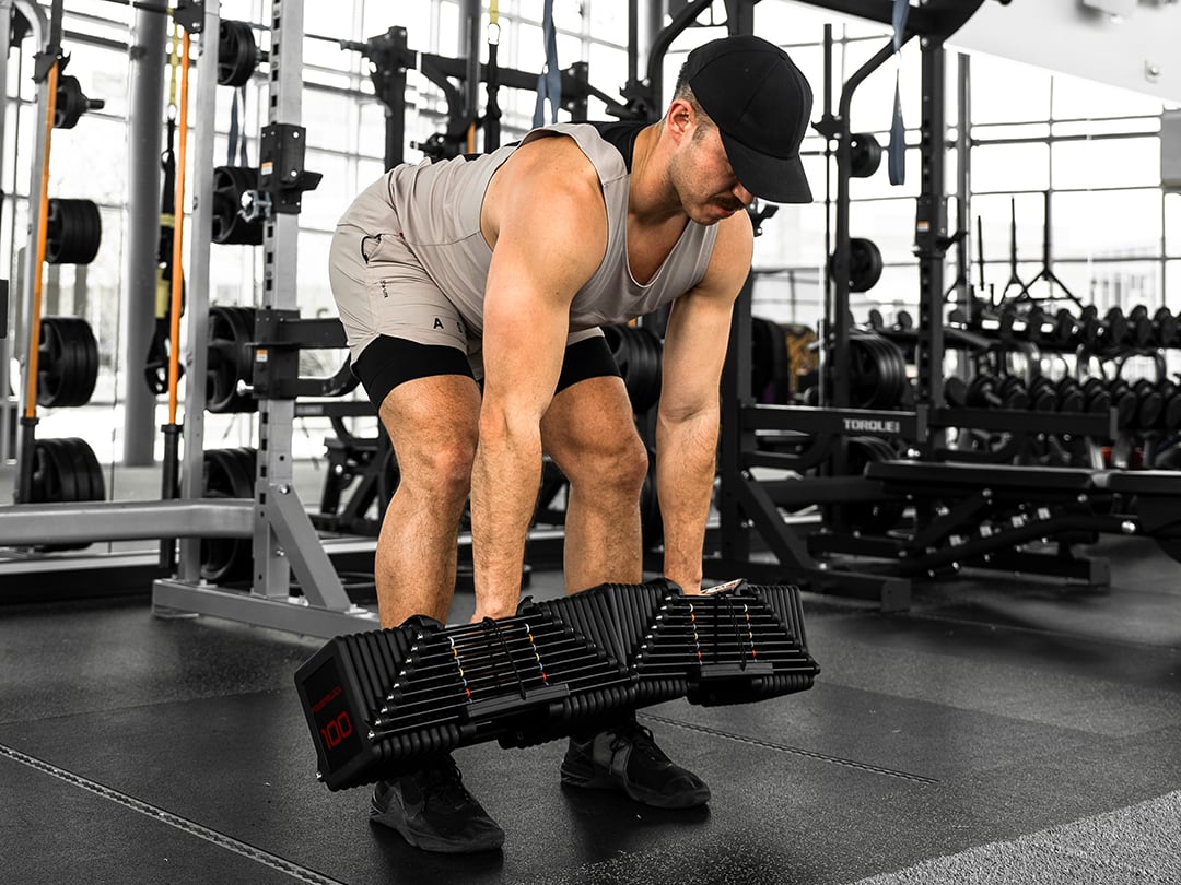 PowerBlock Commercial Pro 100 Set 5-100 lbs w/ Stand PowerBlock Dumbbells commercial-pro-100-_750-00309-00_lifestyle-deadlift