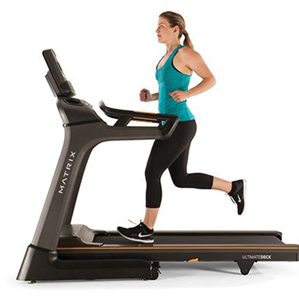 Matrix TF30 Folding Treadmill Matrix Treadmill tf30-mop-female-side-running