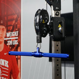Gronk Fitness blue revolving straight bar in use on a cable machine