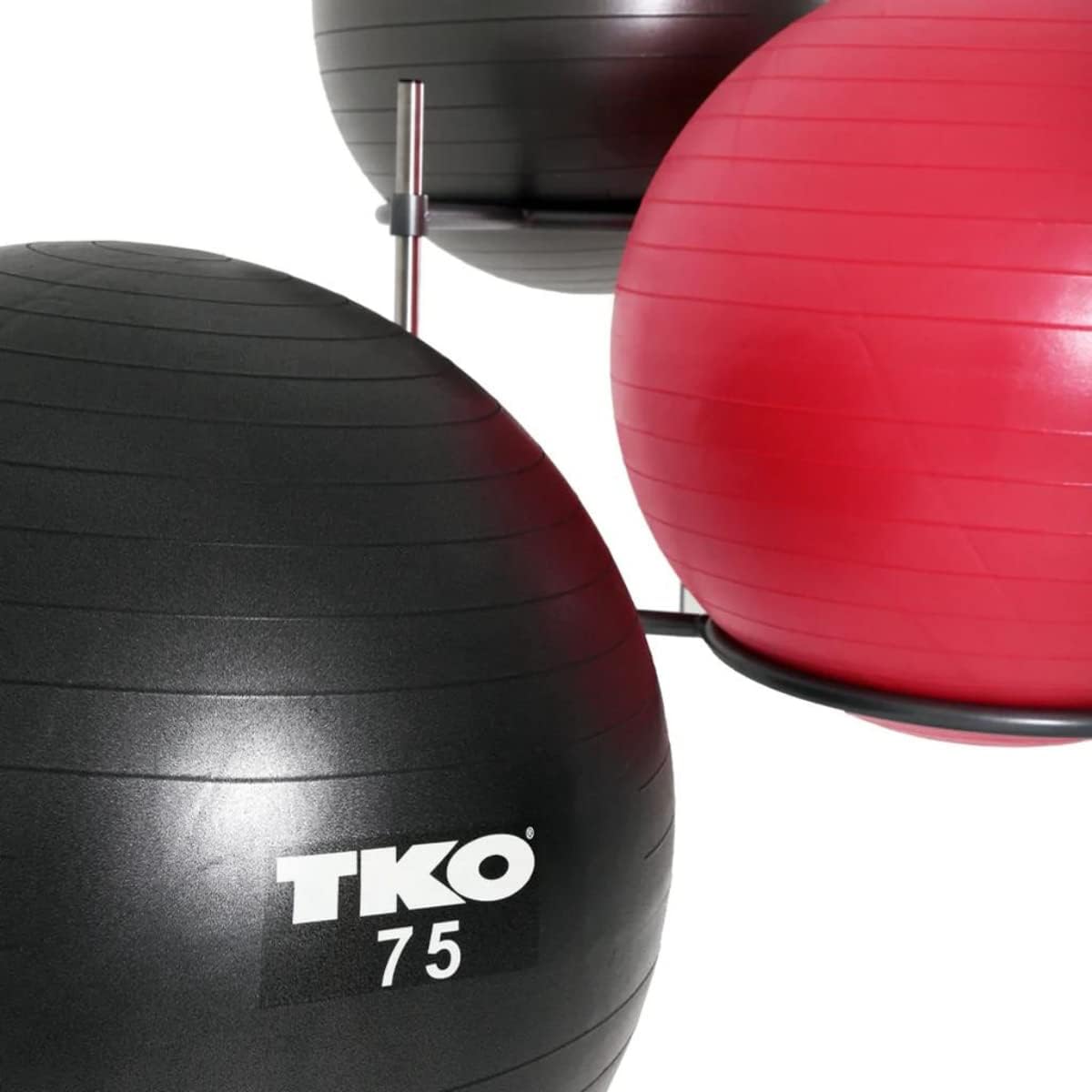 TKO Stability Ball Rack close-up with black and red balls